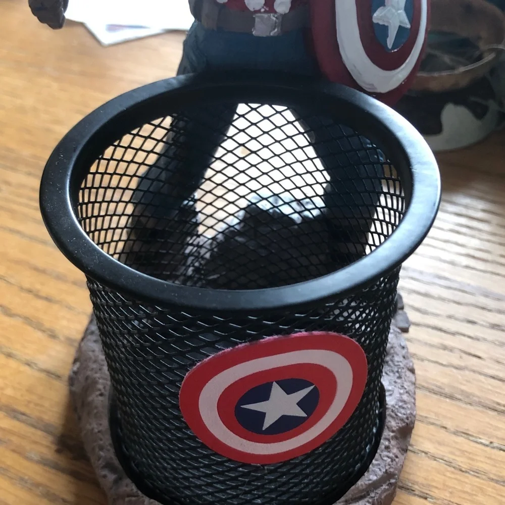 Black Mesh Pen Cup with Figurine Accent